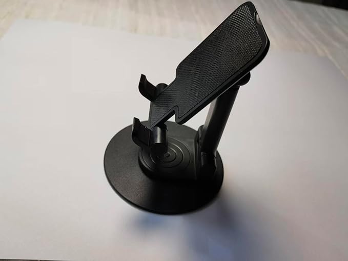 Cell Phone Stand, 360 Rotating Phone Stand, Fully Adjustable and Foldable Desktop Phone Stand. The Base of The Stand is Suitable for All Types of Mobile Phones. (Black)