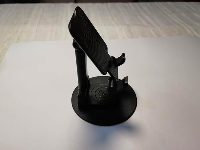 Cell Phone Stand, 360 Rotating Phone Stand, Fully Adjustable and Foldable Desktop Phone Stand. The Base of The Stand is Suitable for All Types of Mobile Phones. (Black)